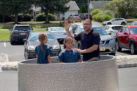 Pastor Baptizing New Converts